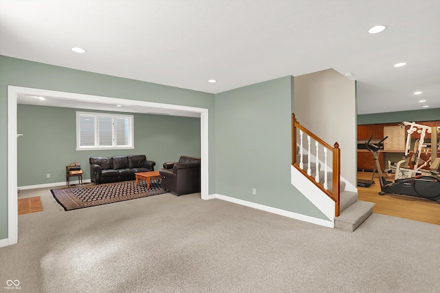 13779 Stone Dr, Carmel, IN 46032 - carpeted living area featuring recessed lighting and stairway
