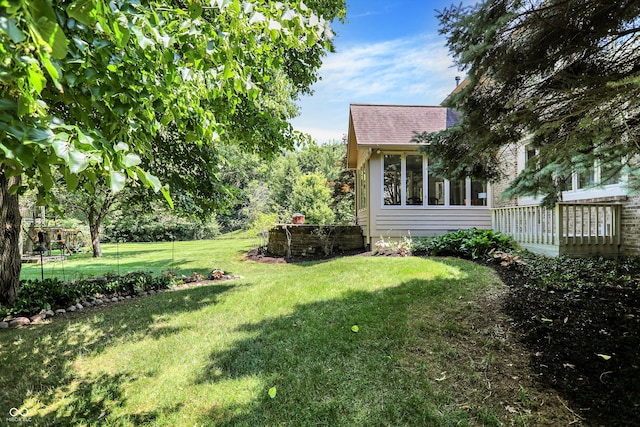 13779 Stone Dr, Carmel, IN 46032 - view of green lawn featuring a sunroom