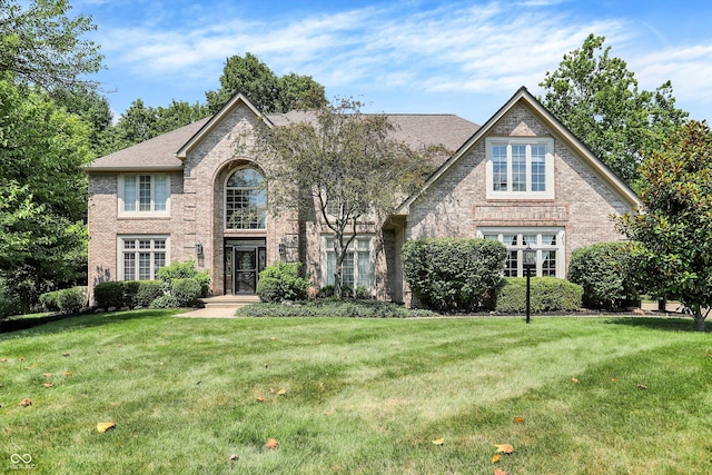 13779 Stone Dr, Carmel, IN 46032 - view of front of house with brick siding and a front lawn