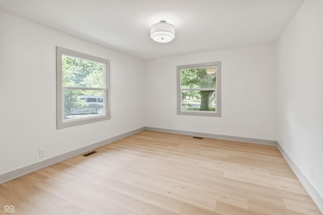 8246 Windcombe Blvd, Indianapolis, IN 46240 - empty room featuring light wood-style floors