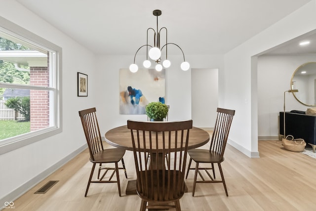 8246 Windcombe Blvd, Indianapolis, IN 46240 - dining room featuring light wood-style floors and baseboards
