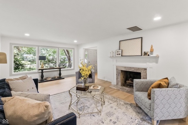 8246 Windcombe Blvd, Indianapolis, IN 46240 - living area featuring wood finished floors, recessed lighting, and a fireplace