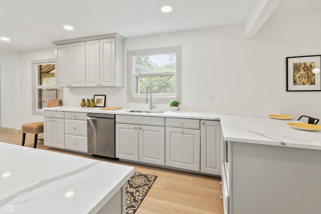 8246 Windcombe Blvd, Indianapolis, IN 46240 - kitchen featuring dishwasher, recessed lighting, light wood-type flooring, and light stone counters