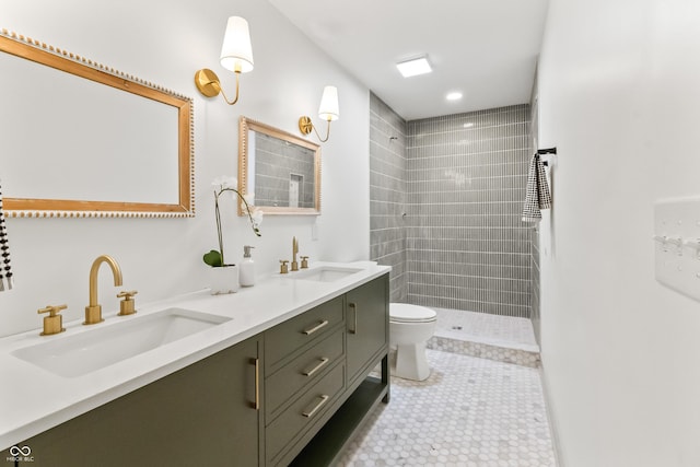 8246 Windcombe Blvd, Indianapolis, IN 46240 - full bath with double vanity, tiled shower, tile patterned floors, and recessed lighting