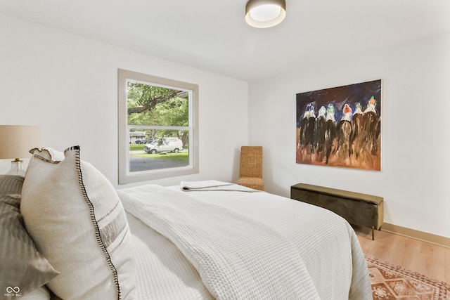 8246 Windcombe Blvd, Indianapolis, IN 46240 - bedroom featuring wood finished floors and baseboards