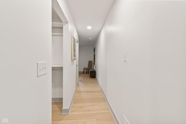 8246 Windcombe Blvd, Indianapolis, IN 46240 - corridor featuring light wood finished floors and recessed lighting