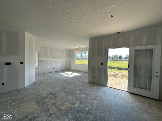201 Holly Ln, Greenfield, IN 46140 - empty room with a textured ceiling
