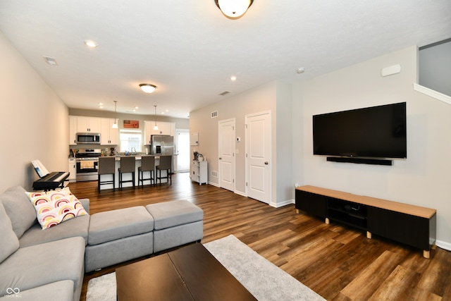 3443 Thomas Jefferson St, Westfield, IN 46074 - living area with dark wood-type flooring and recessed lighting