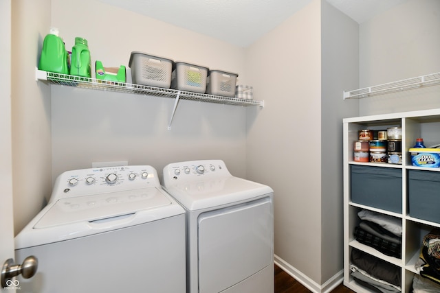 3443 Thomas Jefferson St, Westfield, IN 46074 - washroom featuring washing machine and clothes dryer and wood finished floors