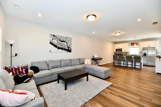 3443 Thomas Jefferson St, Westfield, IN 46074 - living room with light wood-style flooring and recessed lighting