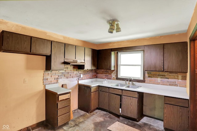 10159 Hodge Rd, Clayton, IN 46118 - kitchen featuring backsplash, under cabinet range hood, and light countertops