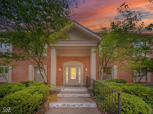 7317 Lions Head Dr Unit A, Indianapolis, IN 46260 - property entrance with brick siding