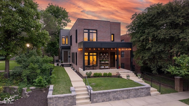 1905 N Alabama St, Indianapolis, IN 46202 - modern home featuring brick siding and a balcony