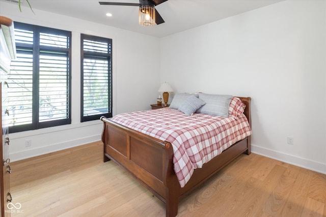 1905 N Alabama St, Indianapolis, IN 46202 - bedroom featuring light wood-type flooring, multiple windows, recessed lighting, and a ceiling fan