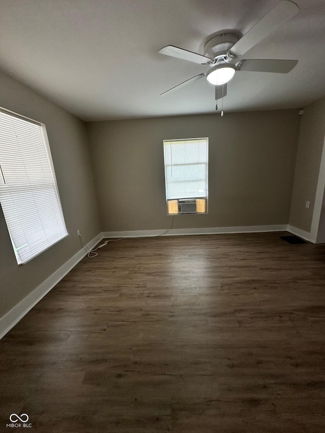 1810 N Parker Ave, Indianapolis, IN 46218 - unfurnished room with dark wood-style flooring and a ceiling fan