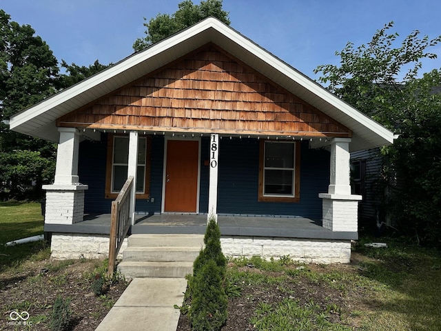 1810 N Parker Ave, Indianapolis, IN 46218 - bungalow-style house featuring a porch