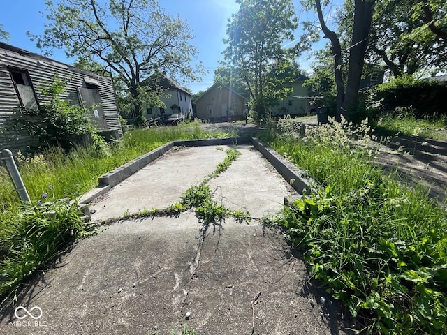 2625 E 12th St, Indianapolis, IN 46201 - view of yard featuring a game area and a residential view