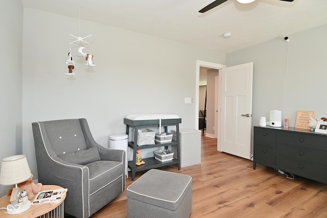 2734 Chalbury Dr, Plainfield, IN 46168 - sitting room with light wood finished floors and ceiling fan