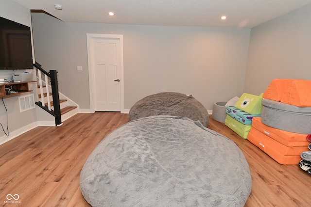 2734 Chalbury Dr, Plainfield, IN 46168 - bedroom with light wood-style flooring and recessed lighting