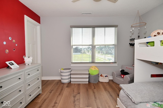 2734 Chalbury Dr, Plainfield, IN 46168 - bedroom featuring light wood finished floors and ceiling fan