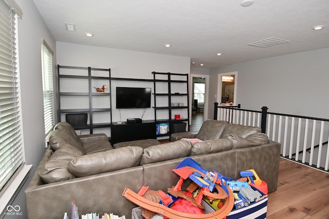 2734 Chalbury Dr, Plainfield, IN 46168 - living room featuring wood finished floors and recessed lighting