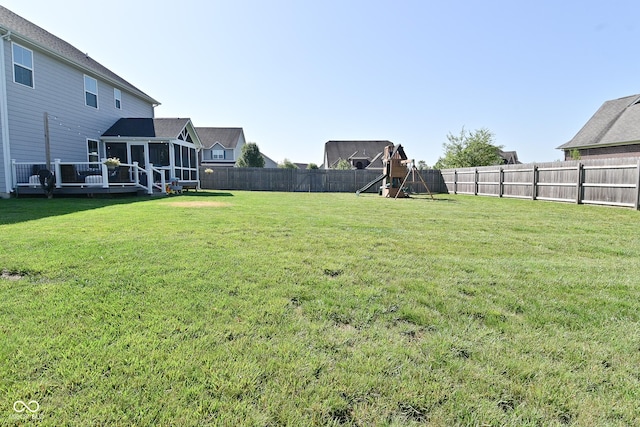 2734 Chalbury Dr, Plainfield, IN 46168 - fenced backyard with a sunroom and a playground