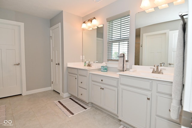 2734 Chalbury Dr, Plainfield, IN 46168 - bathroom with double vanity and tile patterned flooring