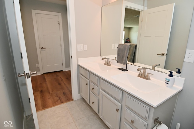 2734 Chalbury Dr, Plainfield, IN 46168 - bathroom with double vanity and tile patterned floors