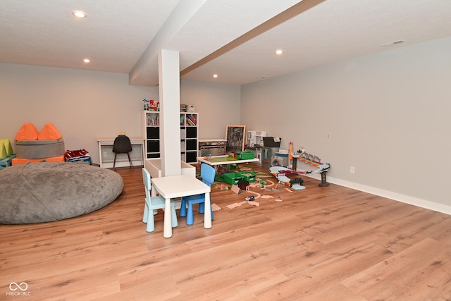 2734 Chalbury Dr, Plainfield, IN 46168 - rec room with wood finished floors and recessed lighting