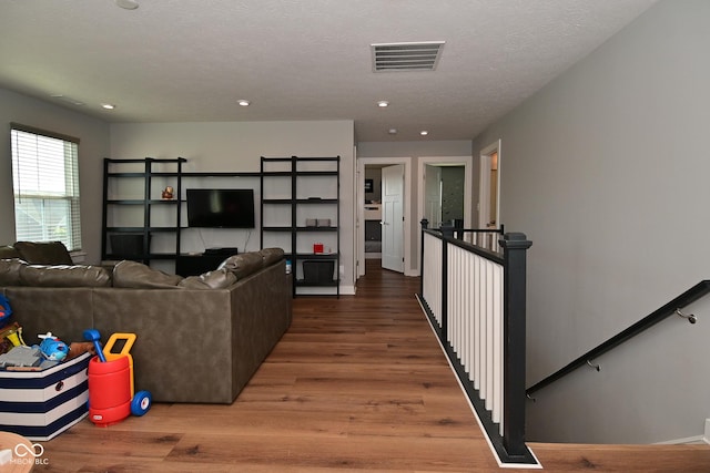 2734 Chalbury Dr, Plainfield, IN 46168 - living room featuring wood finished floors and recessed lighting