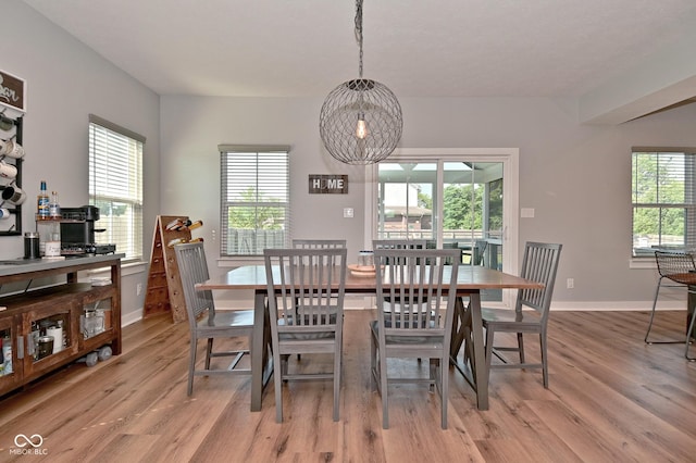 2734 Chalbury Dr, Plainfield, IN 46168 - dining area with light wood-style floors and a chandelier