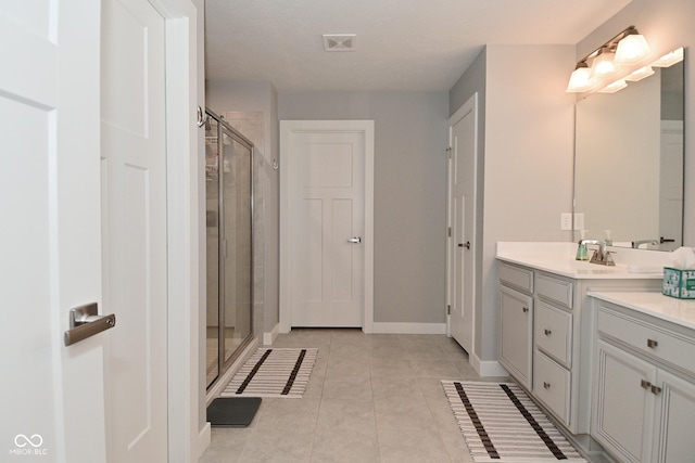 2734 Chalbury Dr, Plainfield, IN 46168 - full bathroom featuring vanity, a shower stall, and tile patterned flooring