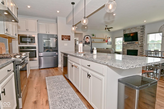 2734 Chalbury Dr, Plainfield, IN 46168 - kitchen featuring stainless steel appliances, extractor fan, plenty of natural light, white cabinets, and recessed lighting