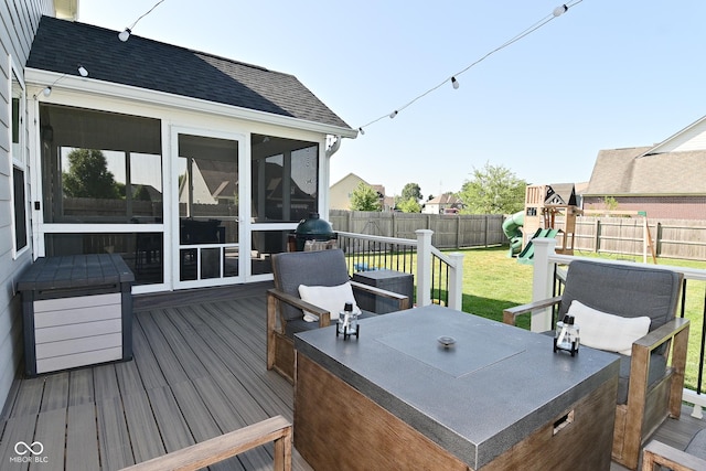 2734 Chalbury Dr, Plainfield, IN 46168 - deck featuring a fenced backyard, a sunroom, and a playground