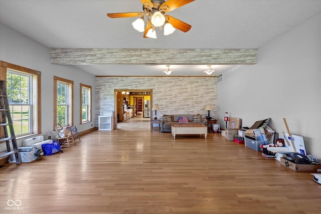 7516 S County Road 300 W, Clayton, IN 46118 - unfurnished living room featuring wood finished floors and a ceiling fan