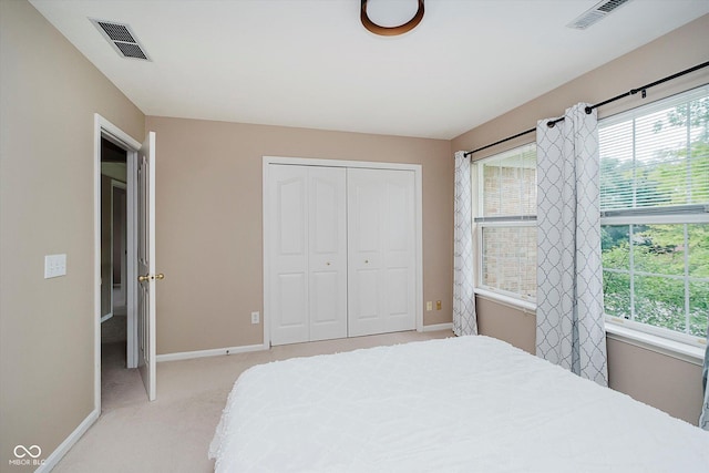 12490 Windbush Way, Carmel, IN 46033 - bedroom featuring light colored carpet and a closet