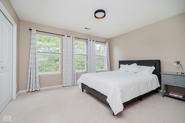 12490 Windbush Way, Carmel, IN 46033 - bedroom featuring multiple windows and carpet