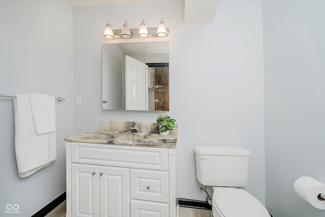 12490 Windbush Way, Carmel, IN 46033 - bathroom featuring vanity and wood finished floors