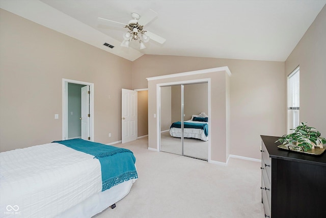 12490 Windbush Way, Carmel, IN 46033 - bedroom featuring lofted ceiling, light colored carpet, a closet, and a ceiling fan