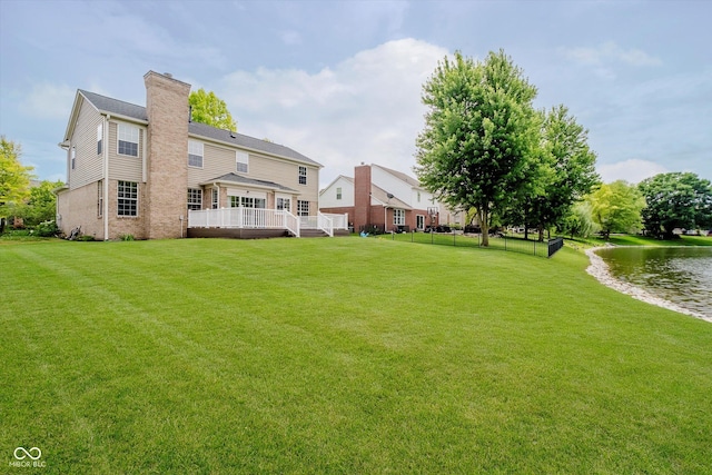 12490 Windbush Way, Carmel, IN 46033 - view of grassy yard with a wooden deck