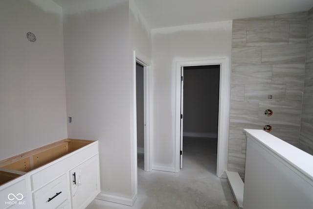 4999 Hummingbird Dr, Brownsburg, IN 46112 - bathroom with concrete floors and baseboards