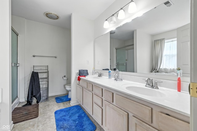 2463 Kettering Way, Indianapolis, IN 46214 - full bathroom with double vanity, a shower with door, and tile patterned flooring
