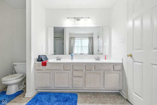2463 Kettering Way, Indianapolis, IN 46214 - bathroom featuring double vanity and tile patterned floors