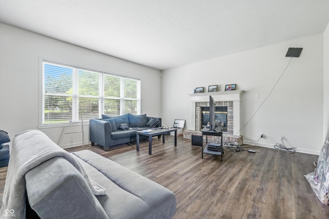 2463 Kettering Way, Indianapolis, IN 46214 - living room with wood finished floors and a brick fireplace
