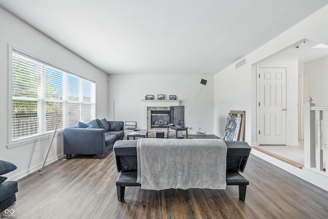2463 Kettering Way, Indianapolis, IN 46214 - living room featuring wood finished floors and a fireplace