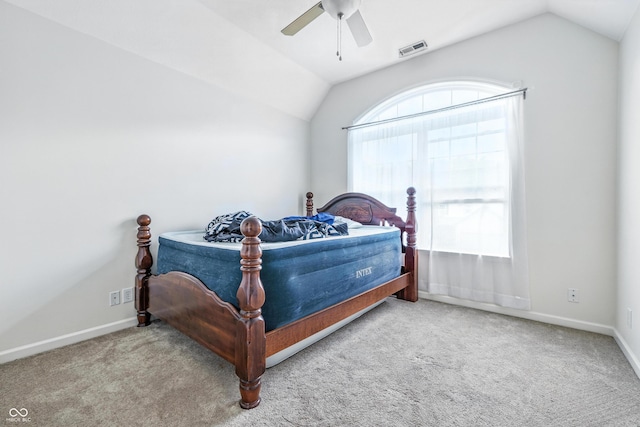 2463 Kettering Way, Indianapolis, IN 46214 - bedroom with vaulted ceiling, carpet, and ceiling fan