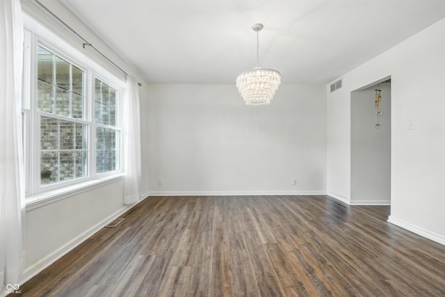 2463 Kettering Way, Indianapolis, IN 46214 - spare room featuring a chandelier and dark wood finished floors