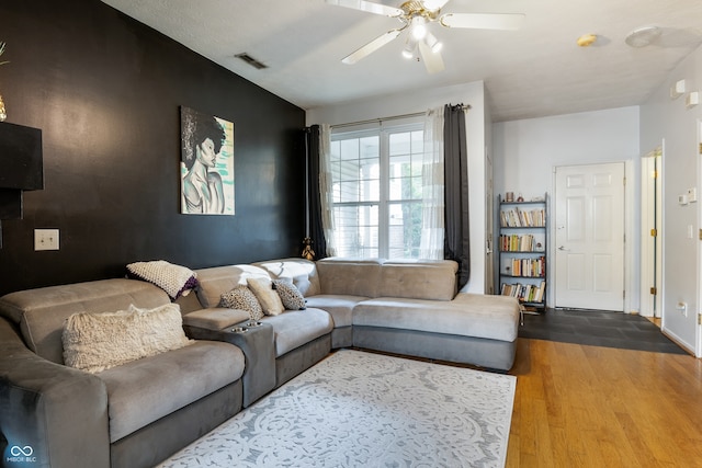 9525 Longwell Dr, Indianapolis, IN 46240 - living area featuring ceiling fan and wood finished floors