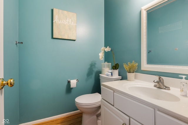 9525 Longwell Dr, Indianapolis, IN 46240 - half bath featuring vanity and wood finished floors