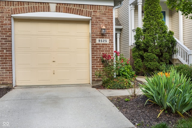 9525 Longwell Dr, Indianapolis, IN 46240 - garage featuring driveway